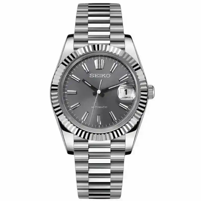 Seiko automatic watch with grey dial, fluted bezel, and stainless steel bracelet