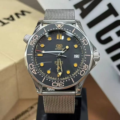 Seiko mod automatic watch with black dial, mesh strap, and yellow markers on display