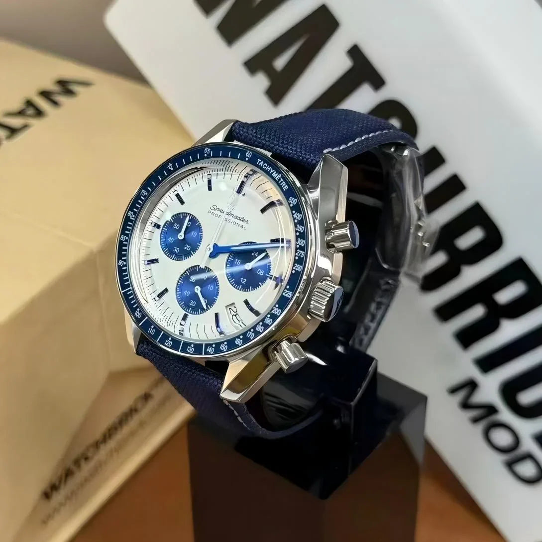 Blue and white chronograph watch with tachymeter bezel and fabric strap on display