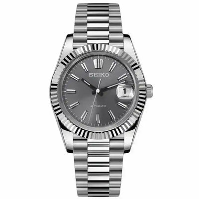 Seiko automatic watch with grey dial, fluted bezel, and stainless steel bracelet