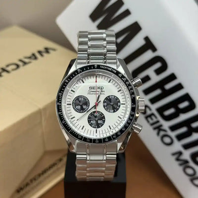 Stainless steel Seiko mod watch with white dial, black subdials, and tachymeter bezel