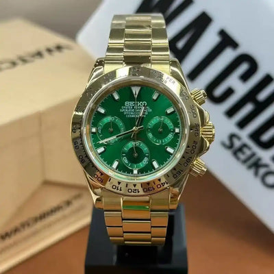 Gold Seiko VK63 mod watch with green dial and chronograph on metal bracelet